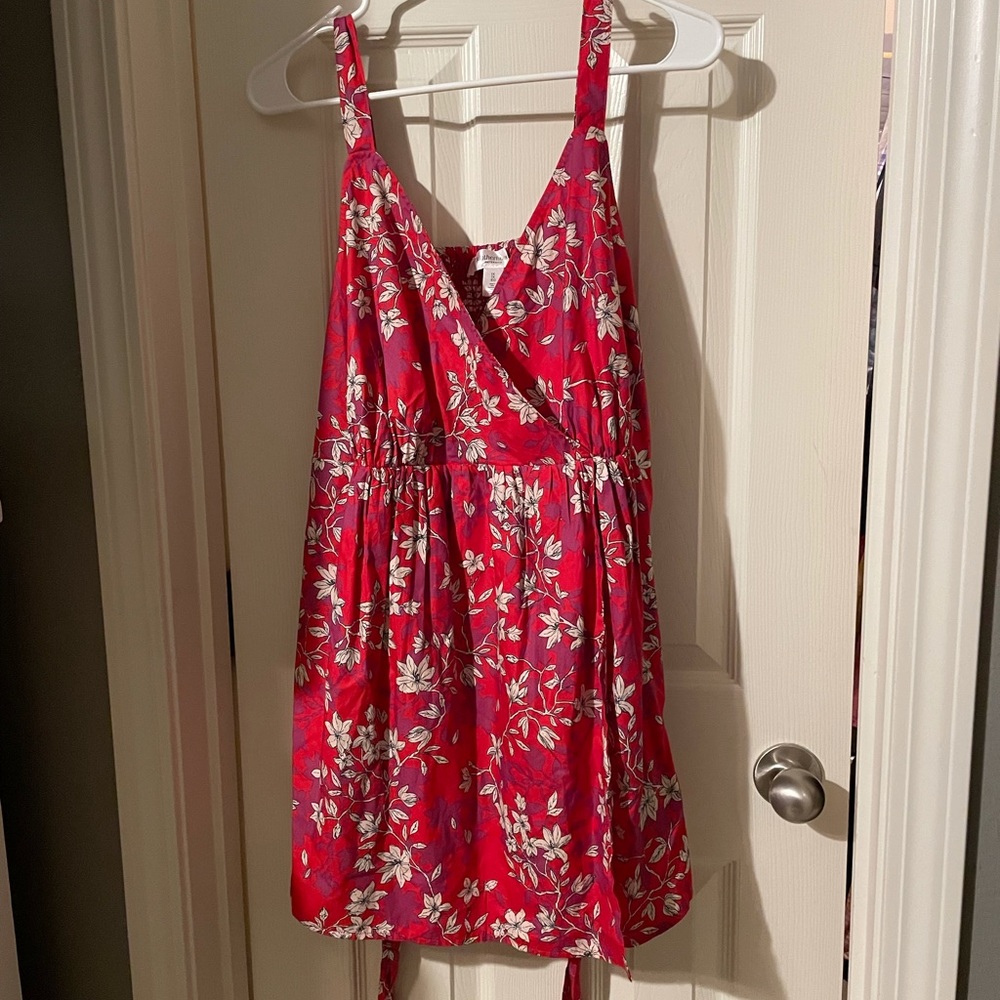 Red maternity tank top with tie back.